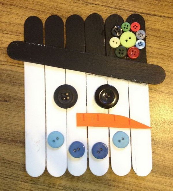 snowman from sticks and buttons