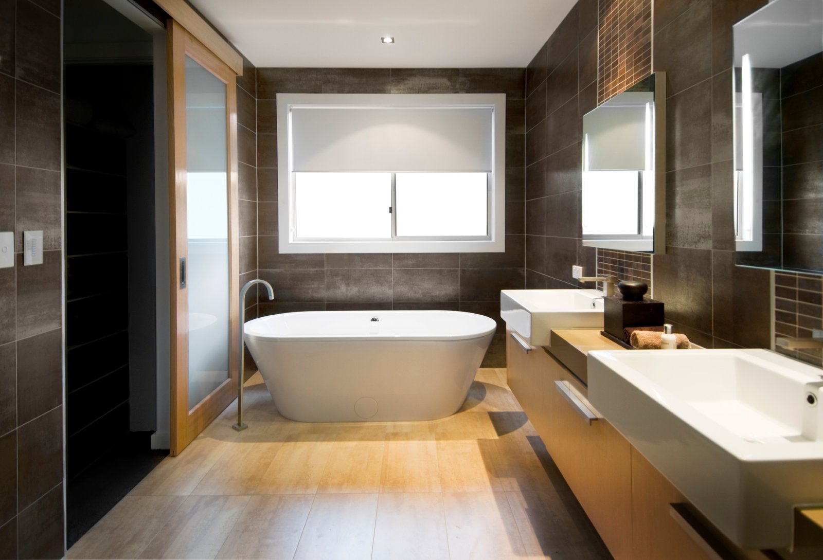 Australian Luxury Bathroom With Brown Tiles And Hardwood Floor 